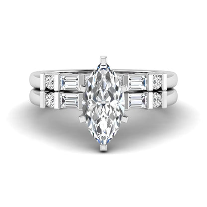Marquise cut lab grown diamond bridal ring set featuring a six-prong solitaire engagement ring with a contour wedding band accented by baguette and round diamonds in a white gold finish.