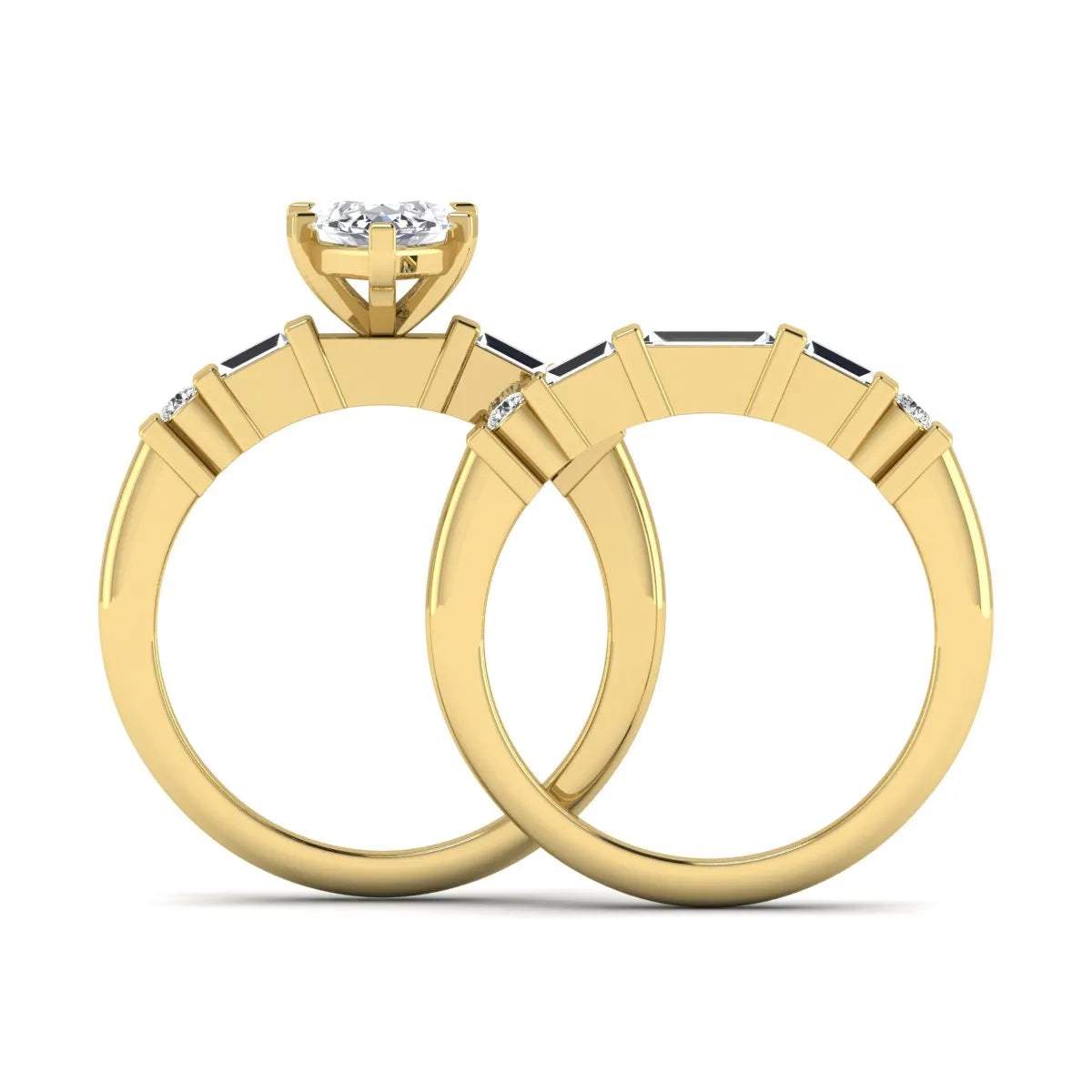 Marquise cut lab grown diamond bridal ring set featuring a six-prong solitaire engagement ring with a contour wedding band accented by baguette and round diamonds in a yellow gold finish.
