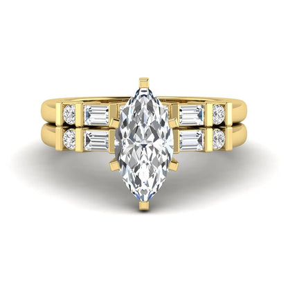 Marquise cut lab grown diamond bridal ring set featuring a six-prong solitaire engagement ring with a contour wedding band accented by baguette and round diamonds in a yellow gold finish.