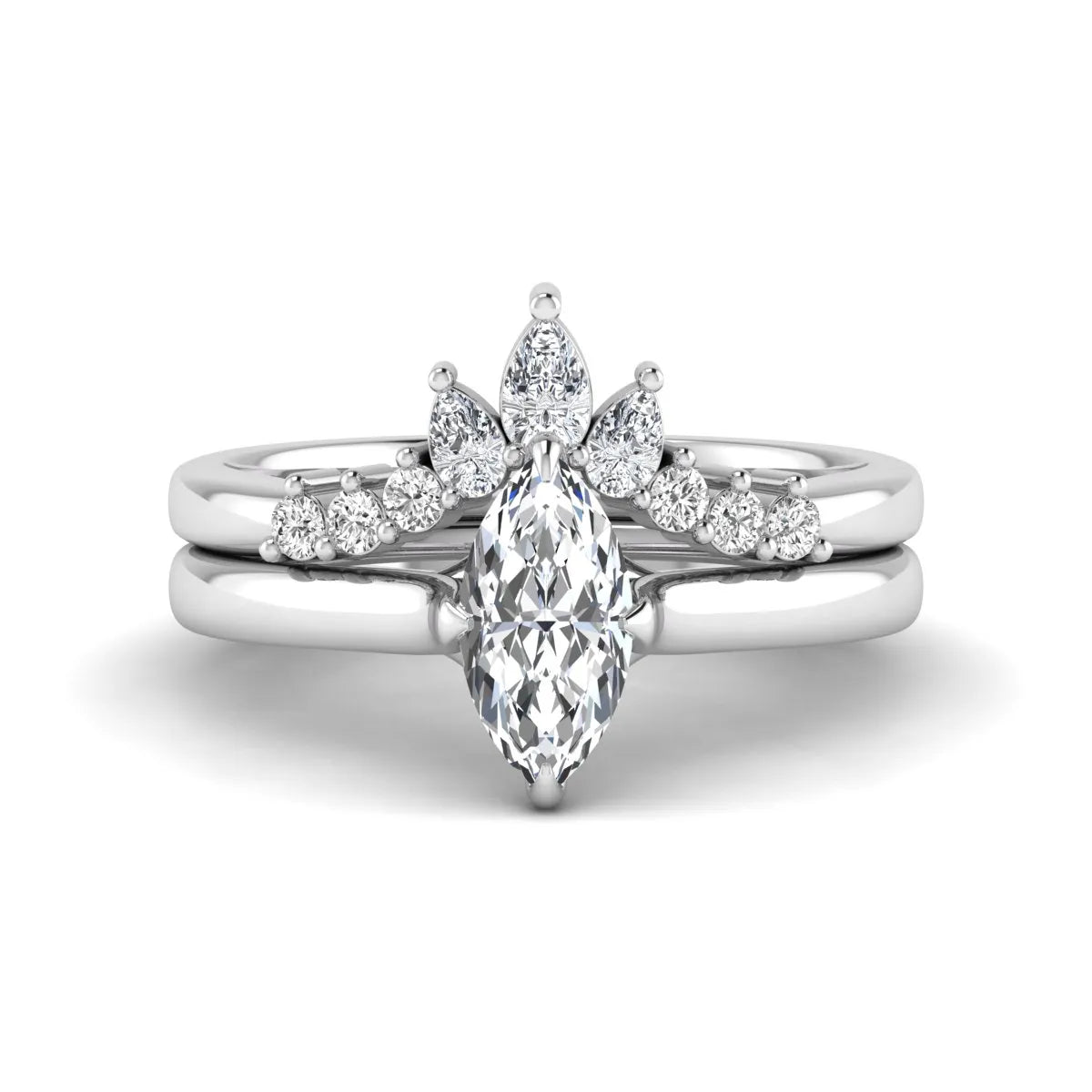 Marquise solitaire lab grown diamond bridal ring set featuring a four-prong marquise center diamond with a crown-inspired contour wedding band accented by pear and round diamonds in white gold