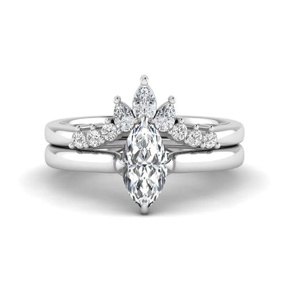 Marquise solitaire lab grown diamond bridal ring set featuring a four-prong marquise center diamond with a crown-inspired contour wedding band accented by pear and round diamonds in white gold