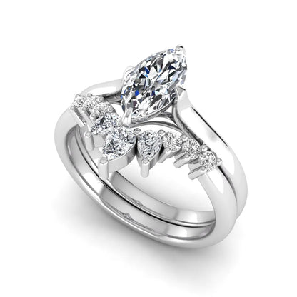Marquise solitaire lab grown diamond bridal ring set featuring a four-prong marquise center diamond with a crown-inspired contour wedding band accented by pear and round diamonds in white gold