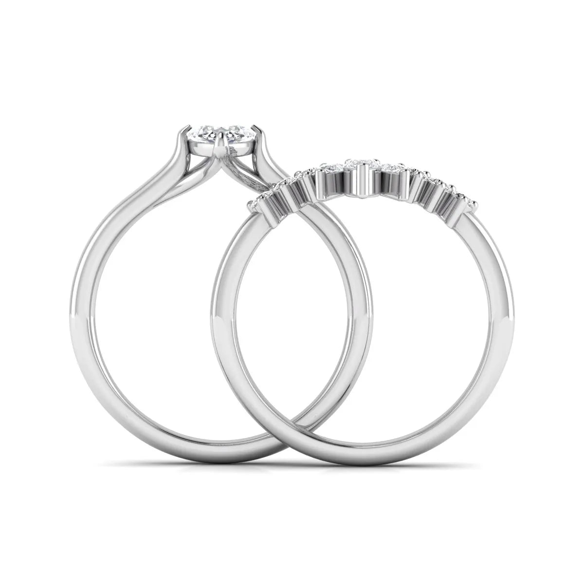 Marquise solitaire lab grown diamond bridal ring set featuring a four-prong marquise center diamond with a crown-inspired contour wedding band accented by pear and round diamonds in white gold