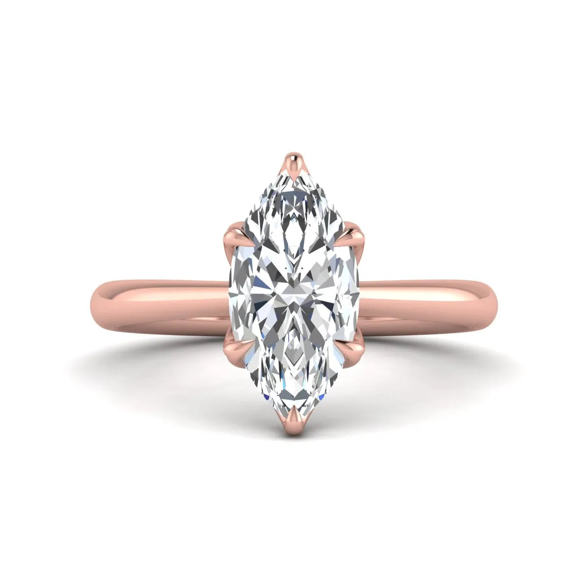 Marquise cut lab grown diamond solitaire engagement ring with six-prong setting and rose gold tone band.