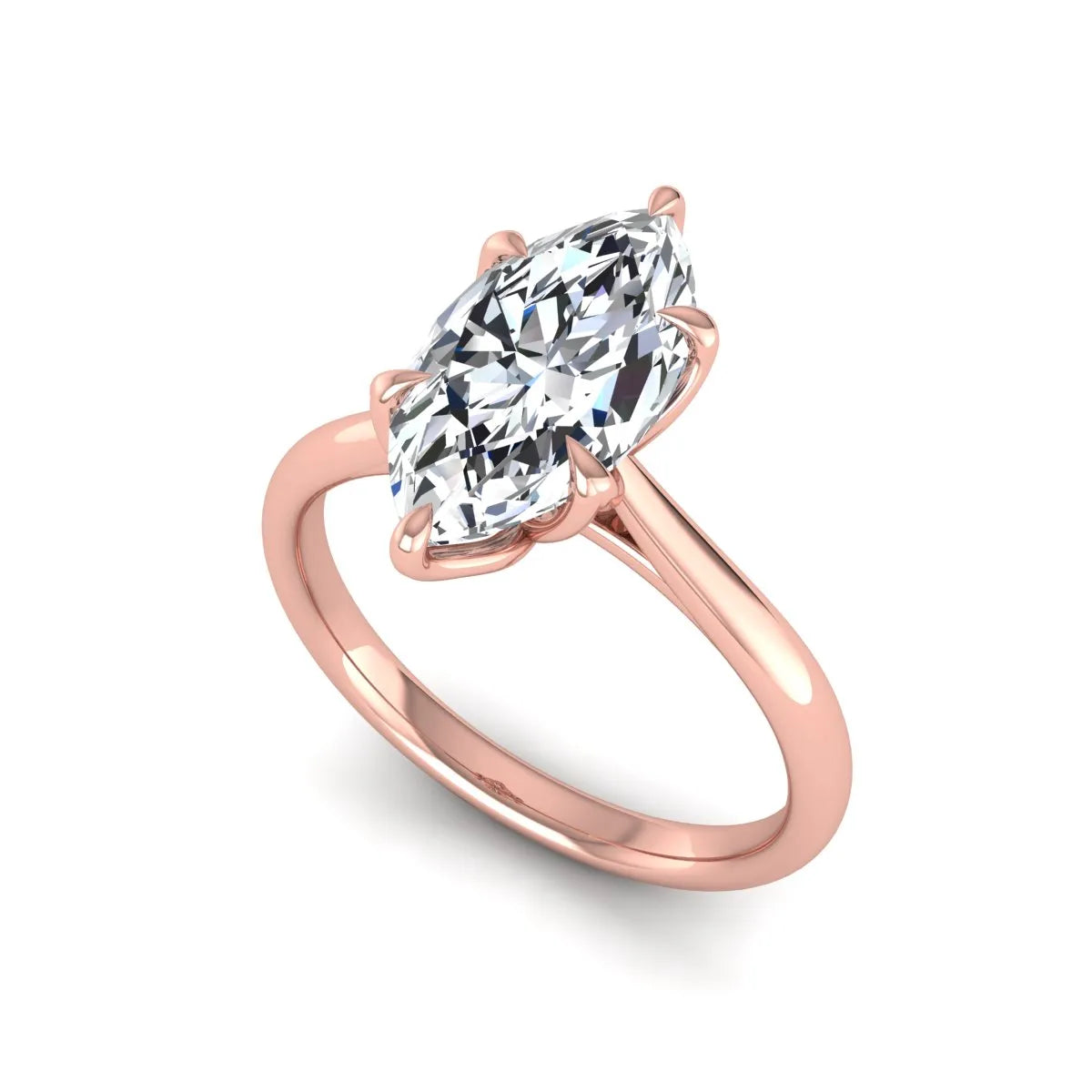 Marquise cut lab grown diamond solitaire engagement ring with six-prong setting and rose gold tone band.
