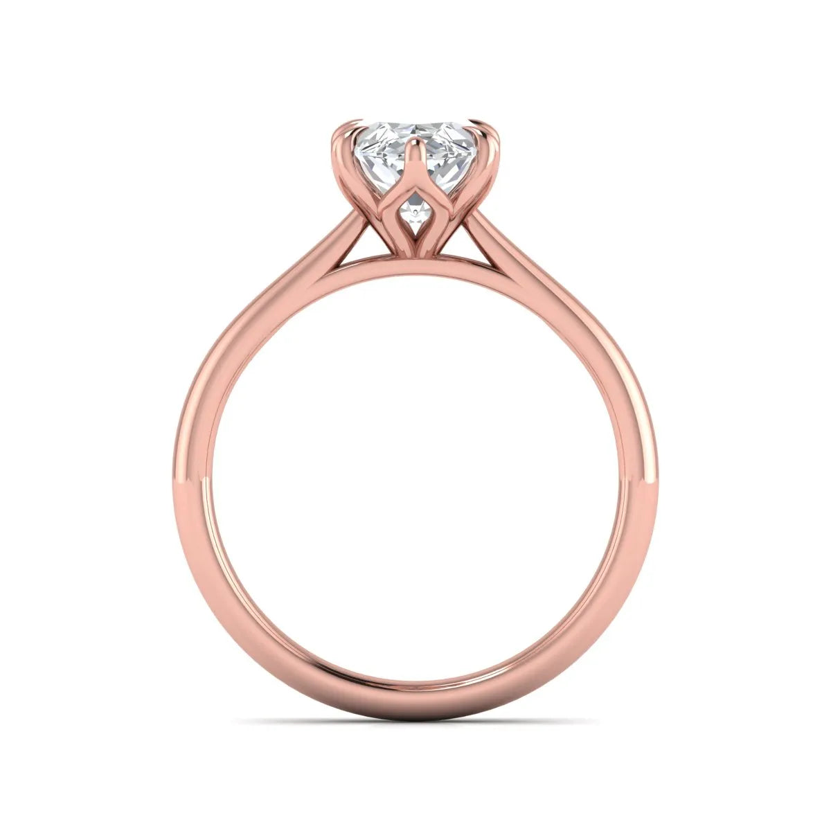 Marquise cut lab grown diamond solitaire engagement ring with six-prong setting and rose gold tone band.