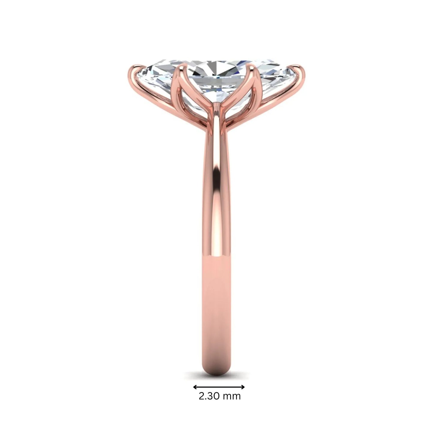 Marquise cut lab grown diamond solitaire engagement ring with six-prong setting and rose gold tone band.
