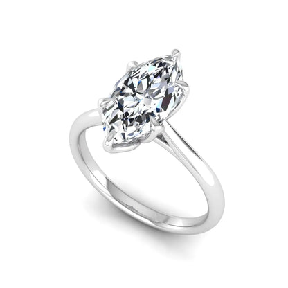 Marquise cut lab grown diamond solitaire engagement ring with six-prong setting and white gold tone band.
