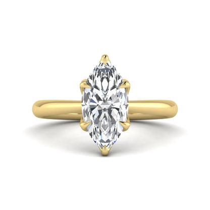 Marquise cut lab grown diamond solitaire engagement ring with six-prong setting and yellow gold tone band.