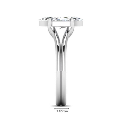 IGI certified 1.63 carat marquise cut lab grown diamond solitaire engagement ring with elegant split shank in white gold.