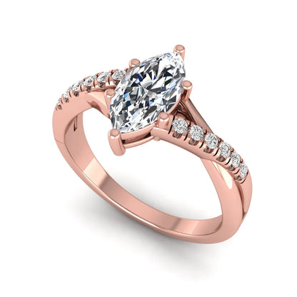 IGI Certified 0.95 carat marquise cut lab grown diamond split shank engagement ring with round accent diamonds in rose gold.
