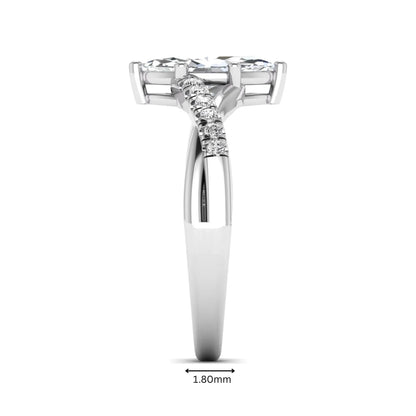 IGI Certified 0.95 carat marquise cut lab grown diamond split shank engagement ring with round accent diamonds in white gold.