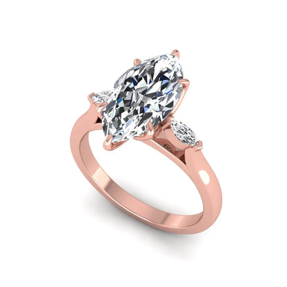 Marquise three stone lab grown diamond engagement ring featuring a 2.48 carat IGI certified center diamond with marquise side diamonds in rose gold