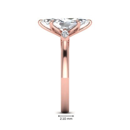 Marquise three stone lab grown diamond engagement ring featuring a 2.48 carat IGI certified center diamond with marquise side diamonds in rose gold