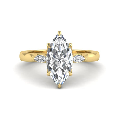 Marquise three stone lab grown diamond engagement ring featuring a 2.48 carat IGI certified center diamond with marquise side diamonds in yellow gold