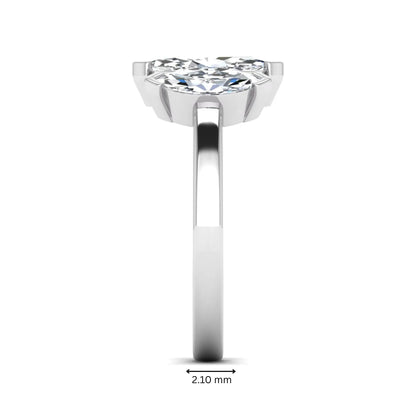 Marquise three stone lab grown diamond engagement ring featuring a center marquise diamond with matching side stones in white gold design.