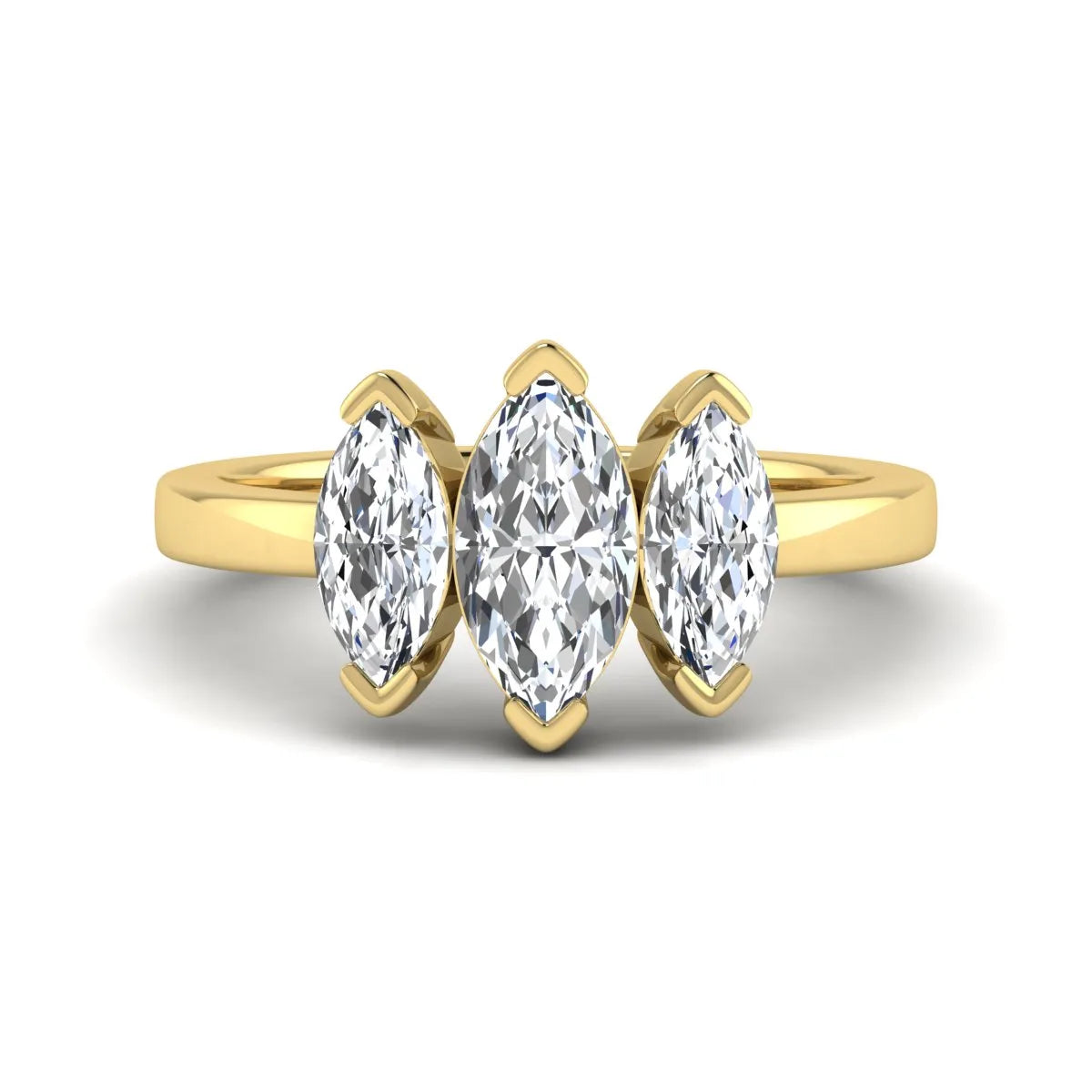 Marquise three stone lab grown diamond engagement ring featuring a center marquise diamond with matching side stones in yellow gold design.