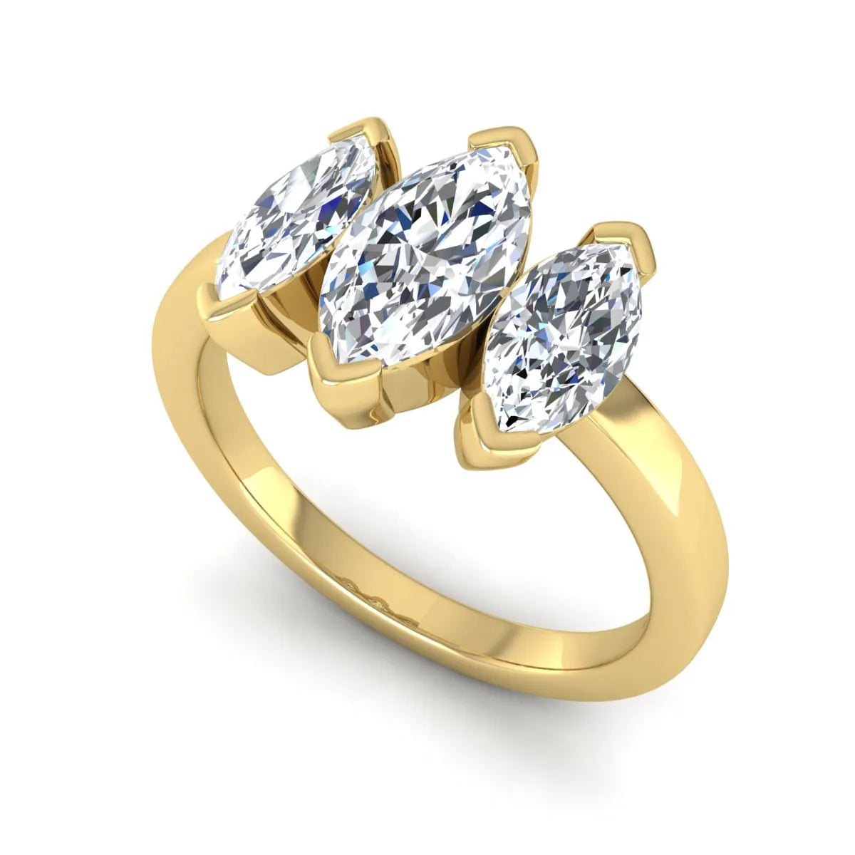 Marquise three stone lab grown diamond engagement ring featuring a center marquise diamond with matching side stones in yellow gold design.