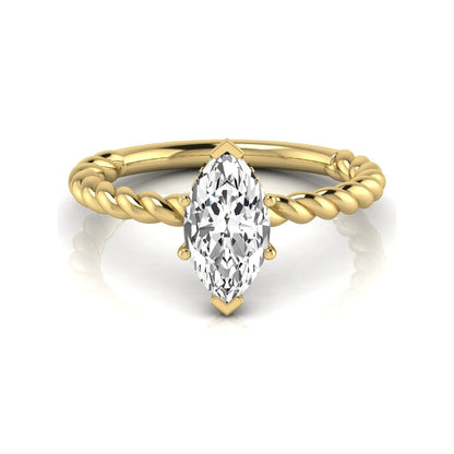 Marquise cut lab grown diamond engagement ring with a twisted band and hidden round accent diamonds in yellow gold style.