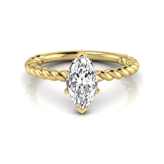 Marquise cut lab grown diamond engagement ring with a twisted band and hidden round accent diamonds in yellow gold style.