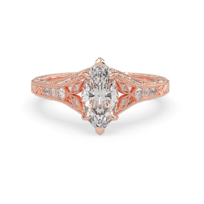 Marquise lab grown diamond engagement ring with ornate vintage split shank and round diamond accents in rose gold