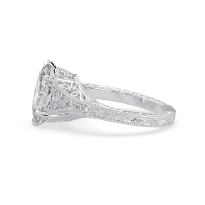 Marquise lab grown diamond engagement ring with ornate vintage split shank and round diamond accents in white gold