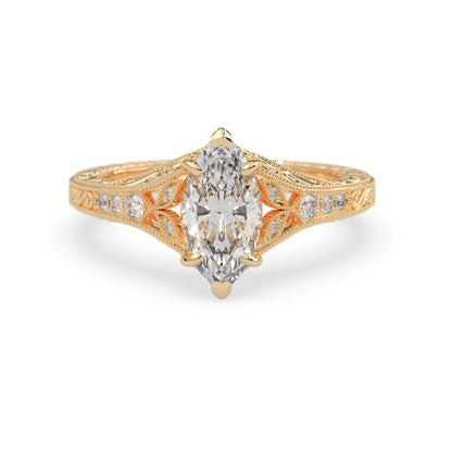 Marquise lab grown diamond engagement ring with ornate vintage split shank and round diamond accents in yellow gold