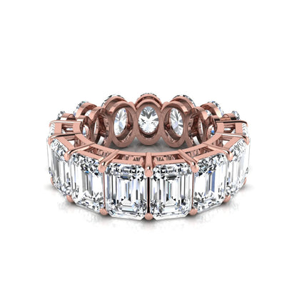 Mixed emerald and oval cut lab grown diamond full eternity band featuring alternating diamonds in a shared prong setting in rose gold