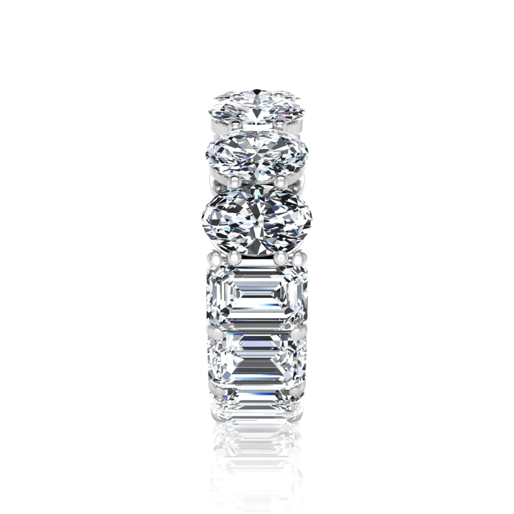 Mixed emerald and oval cut lab grown diamond full eternity band featuring alternating diamonds in a shared prong setting in white gold