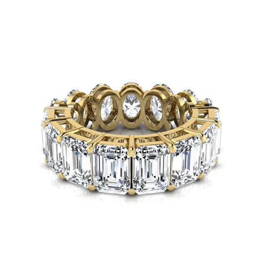 Mixed emerald and oval cut lab grown diamond full eternity band featuring alternating diamonds in a shared prong setting in yellow gold