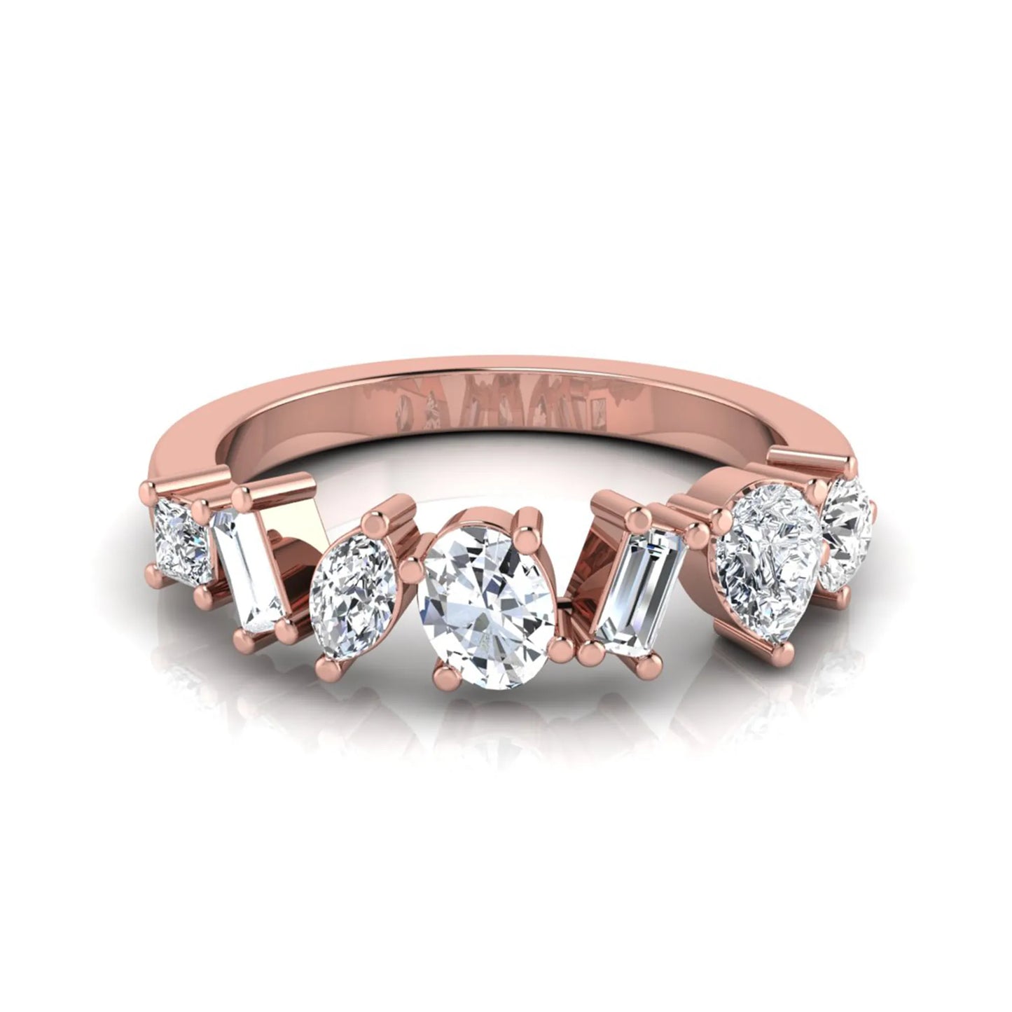 Mixed shape lab grown diamond cluster ring featuring marquise, princess, pear, oval, baguette and round cut diamonds in a prong setting in rose gold