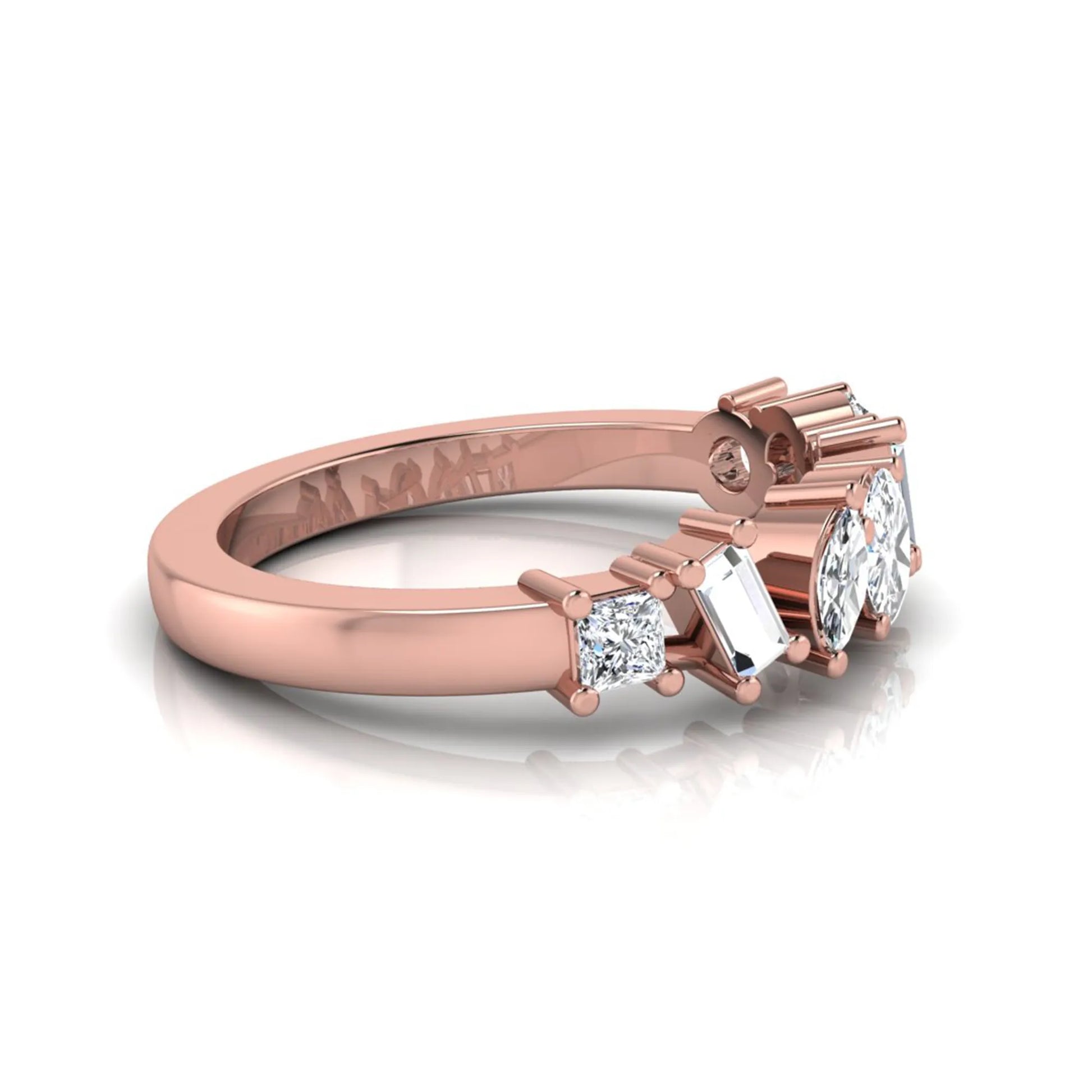 Mixed shape lab grown diamond cluster ring featuring marquise, princess, pear, oval, baguette and round cut diamonds in a prong setting in rose gold