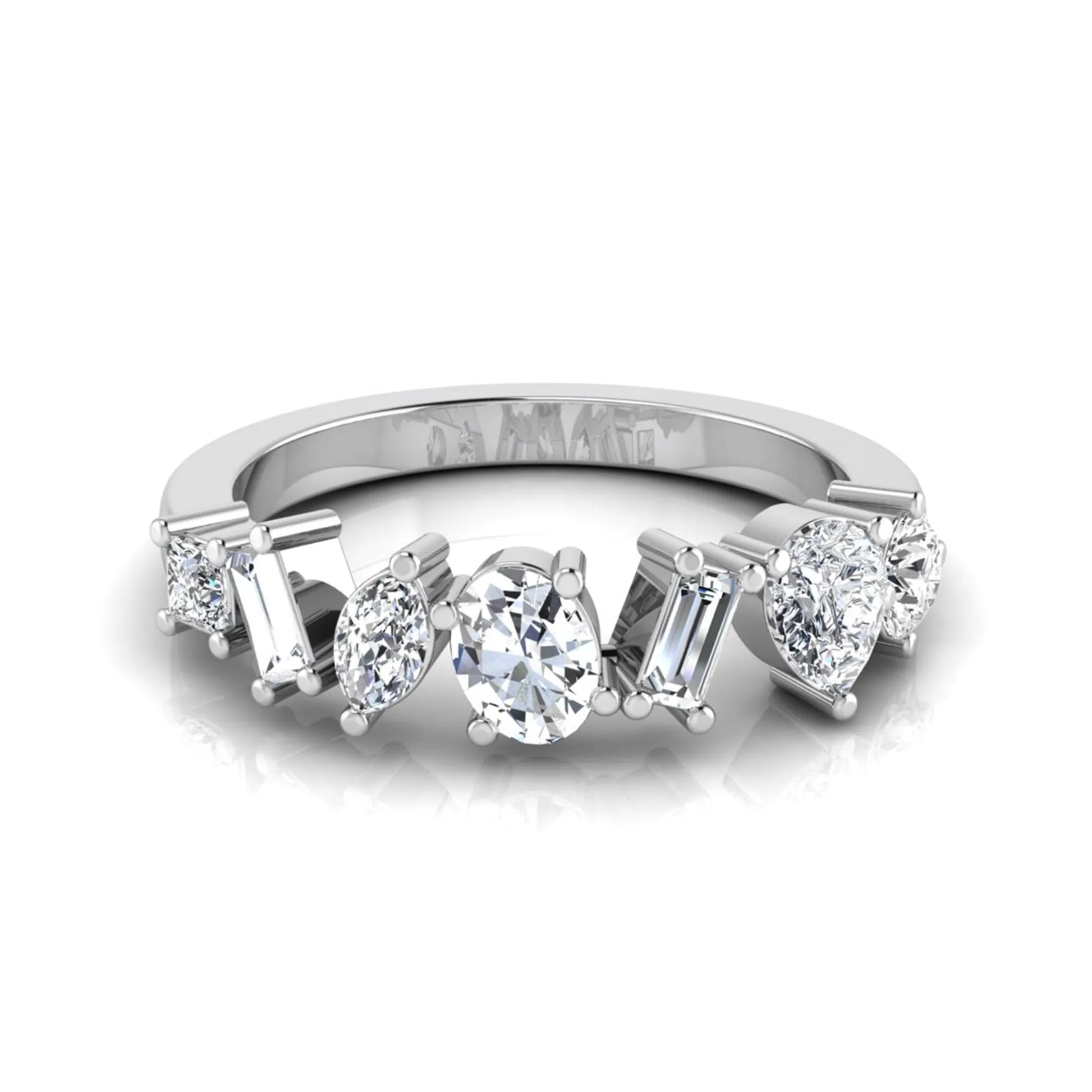 Mixed shape lab grown diamond cluster ring featuring marquise, princess, pear, oval, baguette and round cut diamonds in a prong setting in white gold