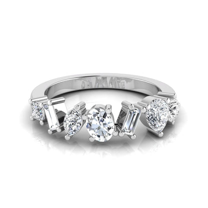 Mixed shape lab grown diamond cluster ring featuring marquise, princess, pear, oval, baguette and round cut diamonds in a prong setting in white gold