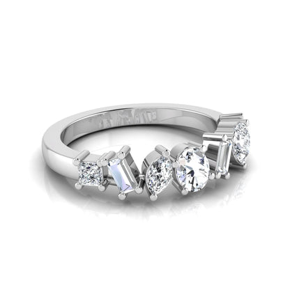 Mixed shape lab grown diamond cluster ring featuring marquise, princess, pear, oval, baguette and round cut diamonds in a prong setting in white gold