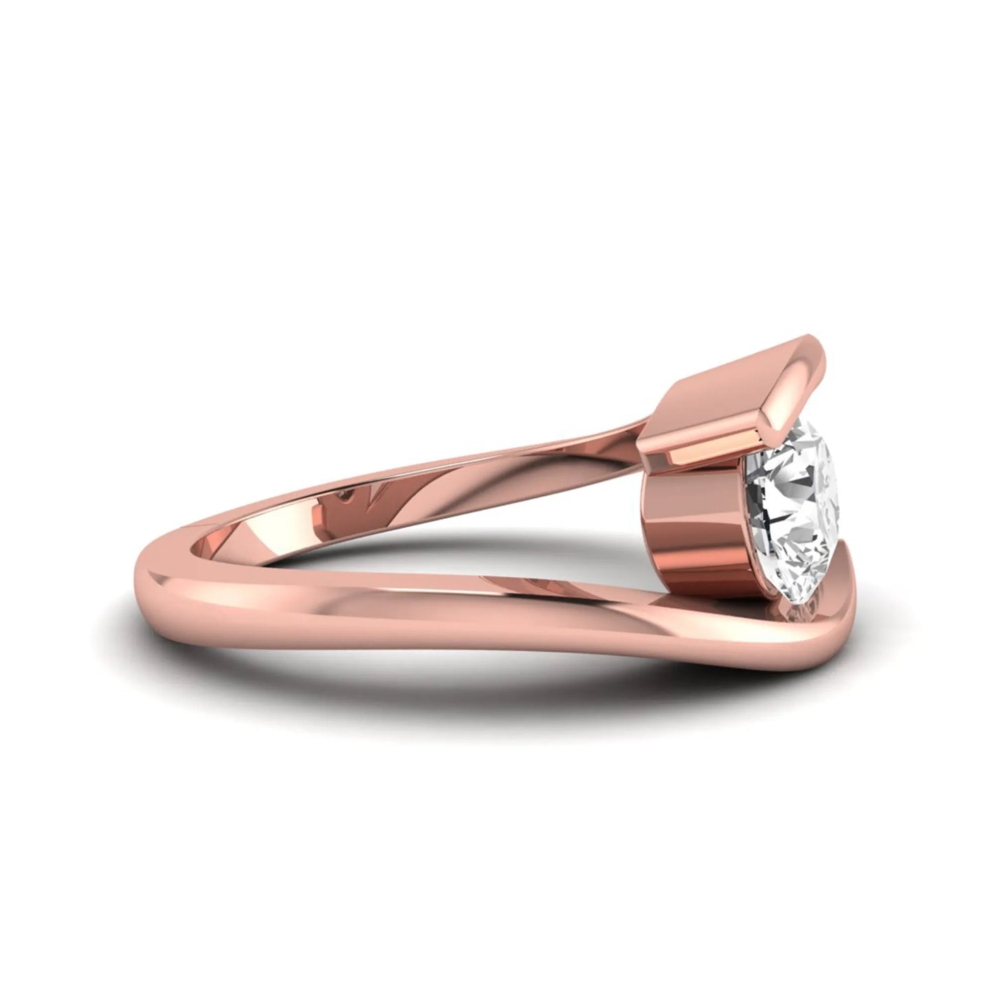 Round cut lab grown diamond solitaire engagement ring with a modern bypass setting in a rose gold tone contemporary design.