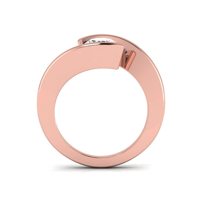 Round cut lab grown diamond solitaire engagement ring with a modern bypass setting in a rose gold tone contemporary design.