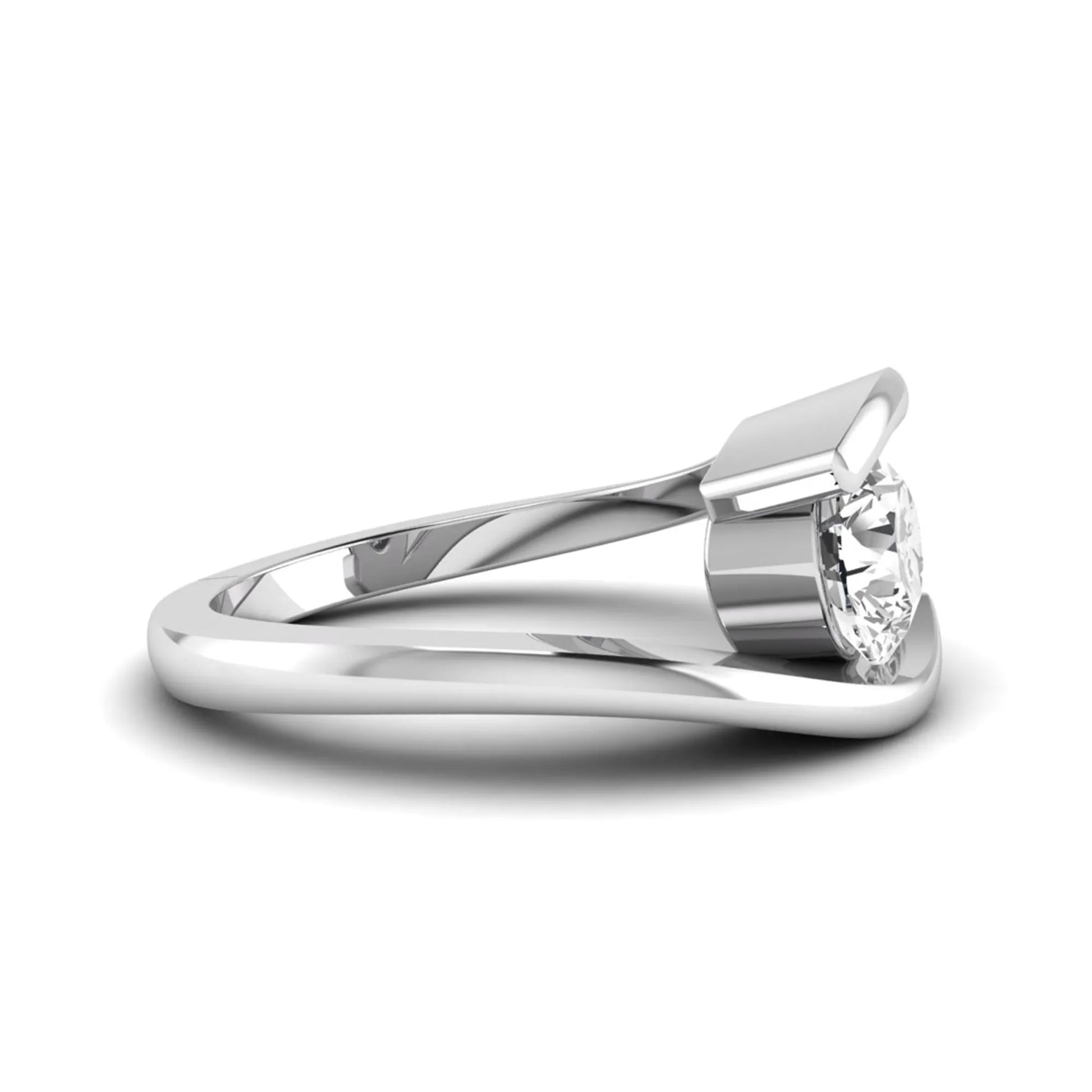 Round cut lab grown diamond solitaire engagement ring with a modern bypass setting in a white gold tone contemporary design.