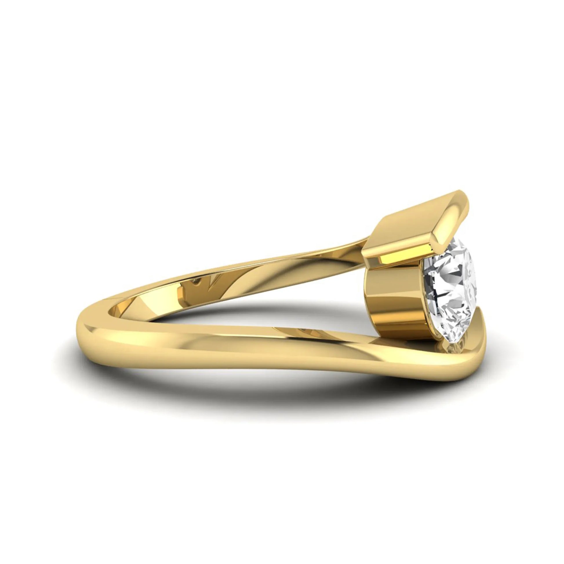 Round cut lab grown diamond solitaire engagement ring with a modern bypass setting in a yellow gold tone contemporary design.