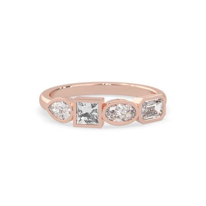 Multi shape lab grown diamond half eternity wedding band with emerald, pear, oval and princess cut diamonds in bezel settings in rose gold