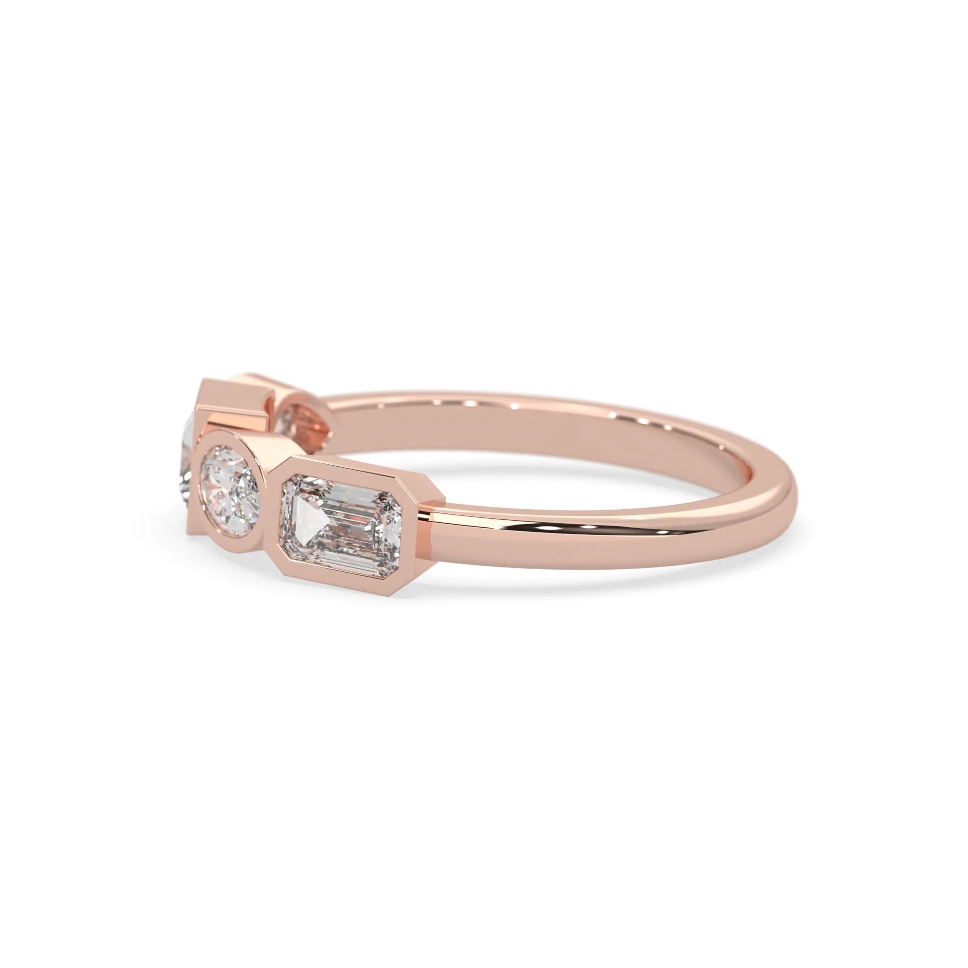 Multi shape lab grown diamond half eternity wedding band with emerald, pear, oval and princess cut diamonds in bezel settings in rose gold
