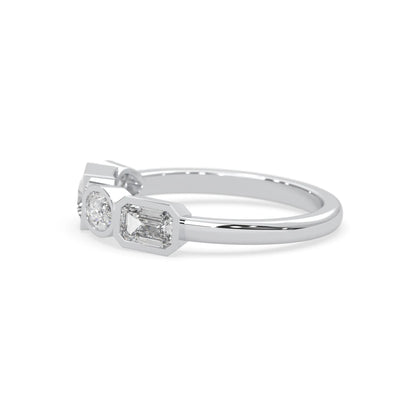 Multi shape lab grown diamond half eternity wedding band with emerald, pear, oval and princess cut diamonds in bezel settings in white gold