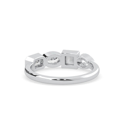 Multi shape lab grown diamond half eternity wedding band with emerald, pear, oval and princess cut diamonds in bezel settings in white gold