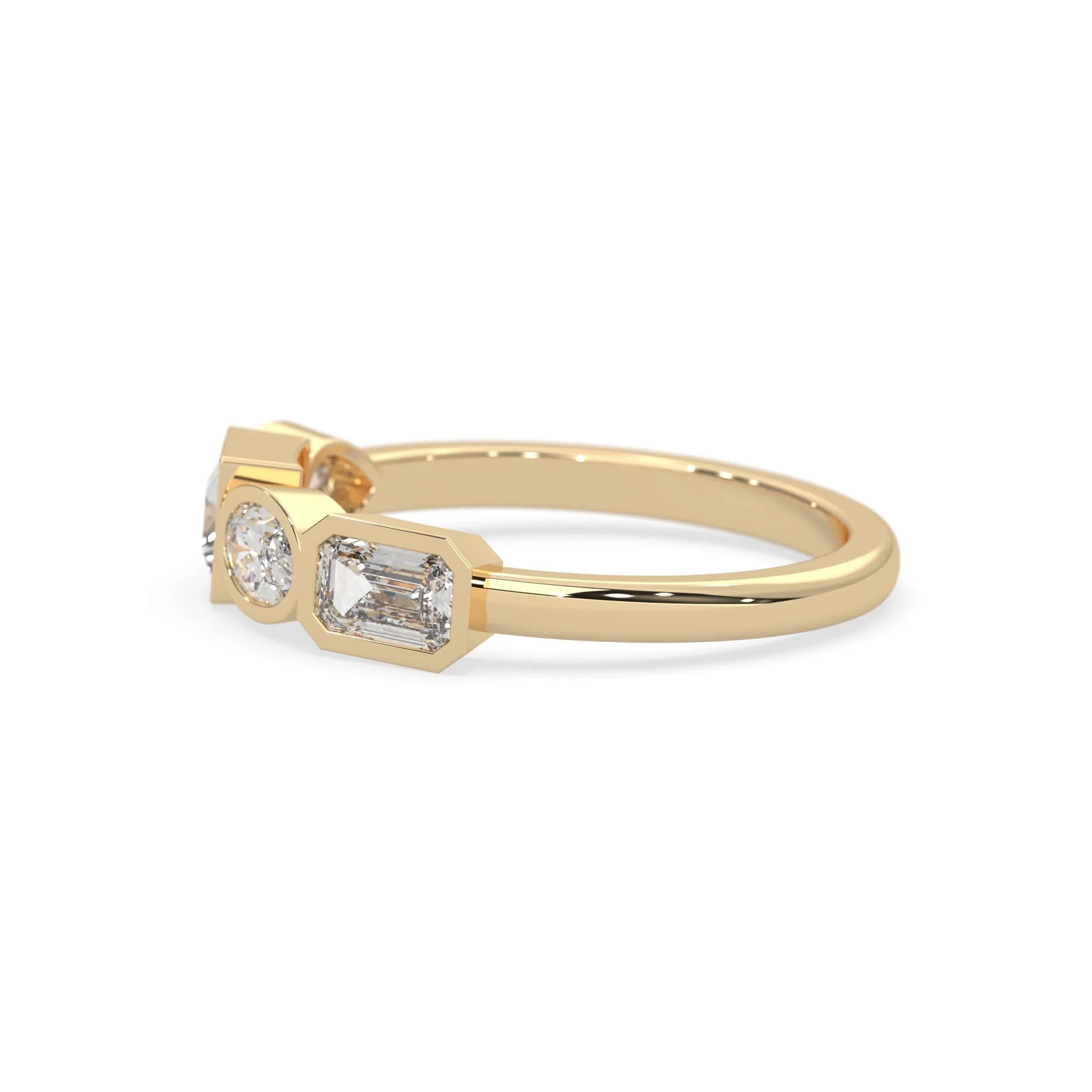 Multi shape lab grown diamond half eternity wedding band with emerald, pear, oval and princess cut diamonds in bezel settings in yellow gold