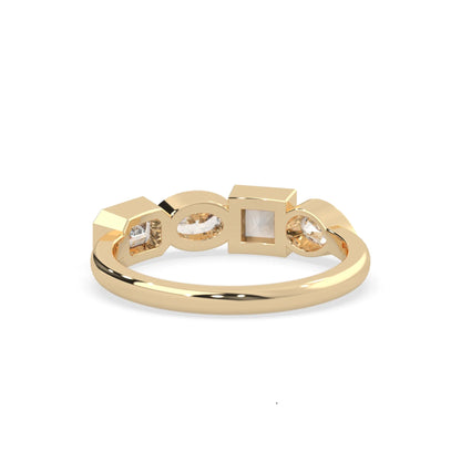 Multi shape lab grown diamond half eternity wedding band with emerald, pear, oval and princess cut diamonds in bezel settings in yellow gold