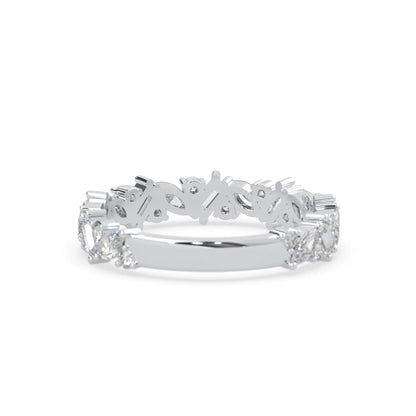 Multi shape lab grown diamond eternity band featuring baguette, marquise and round cut diamonds in a floral cluster design in white gold