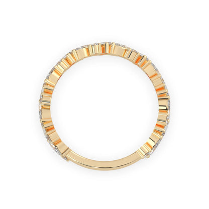 Multi shape lab grown diamond eternity band featuring baguette, marquise and round cut diamonds in a floral cluster design in yellow gold