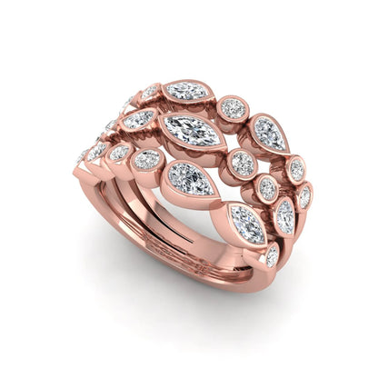 Multi shape lab grown diamond stacking ring featuring marquise, pear, and round bezel set diamonds totaling 1.50 carats in rose gold.
