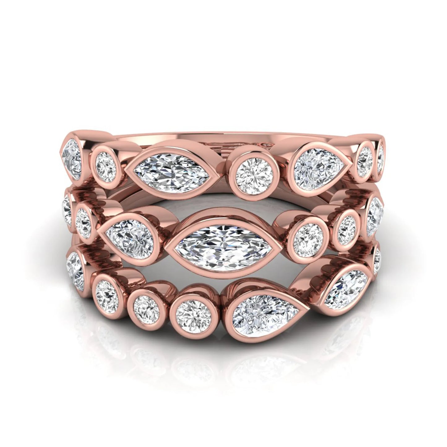 Multi shape lab grown diamond stacking ring featuring marquise, pear, and round bezel set diamonds totaling 1.50 carats in rose gold.
