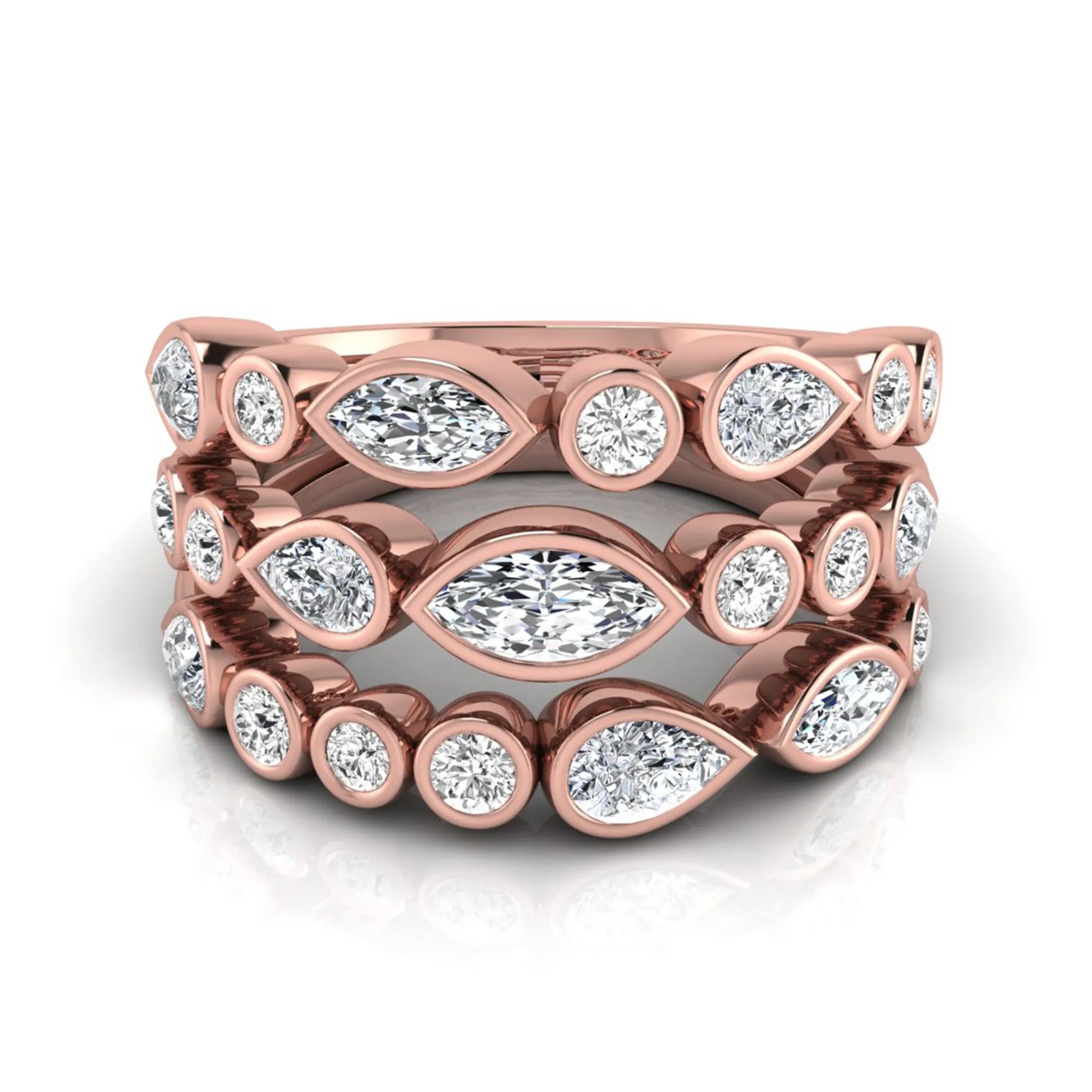 Multi shape lab grown diamond stacking ring featuring marquise, pear, and round bezel set diamonds totaling 1.50 carats in rose gold.